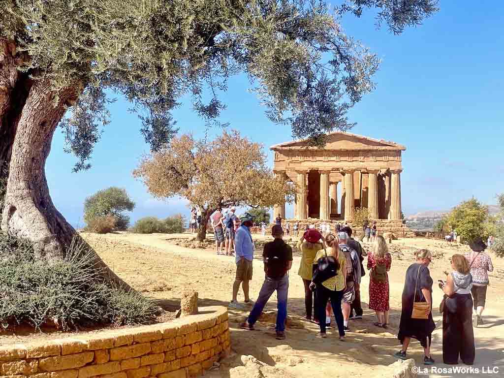 Image link of a a small group on a La RosaWorks custom boutique tour exploring the temple ruins of Agrigento, Sicily.