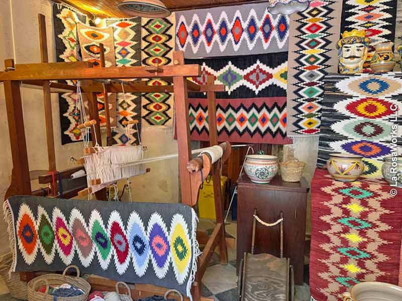 Hand-woven carpets are typical in Erice.